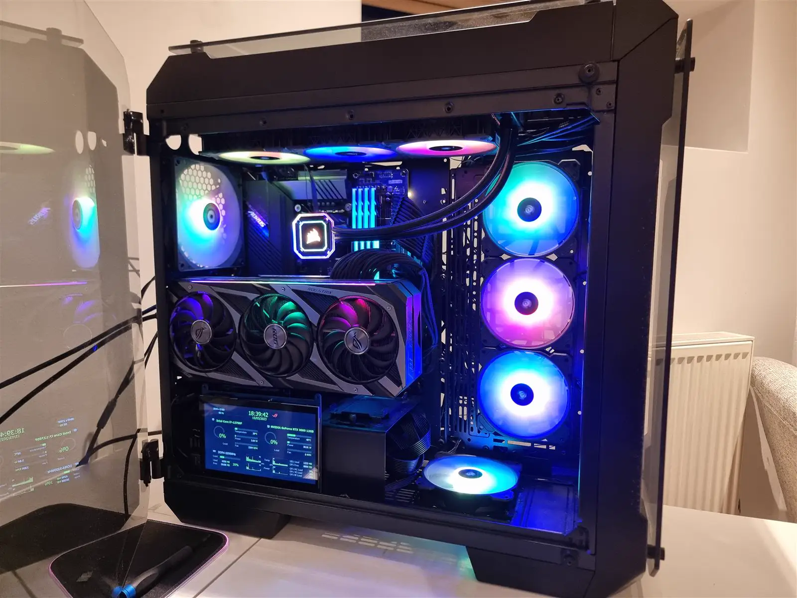 A custom-built PC with liquid cooling and lit fans