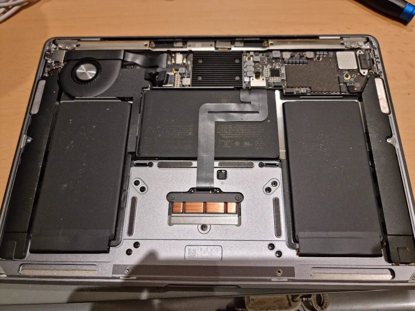 Inside a MacBook during a repair